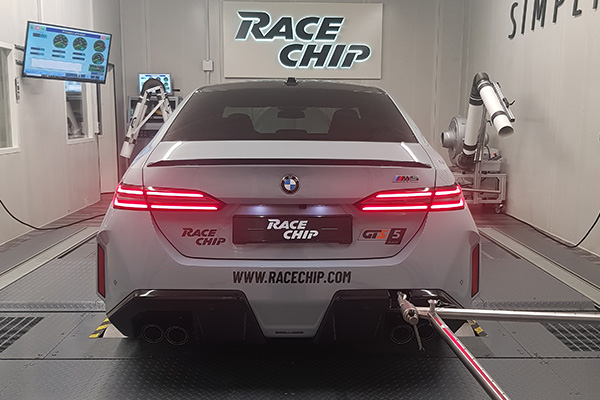 An BMW M5 being analysed and calibrated on a dyno.