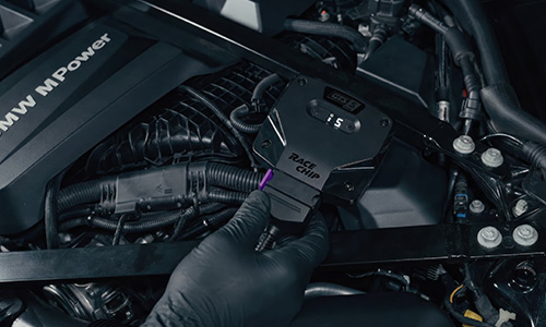 RaceChip module professionally installed in the engine bay