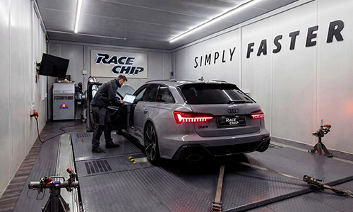 Vehicle on a dynamometer measuring engine performance