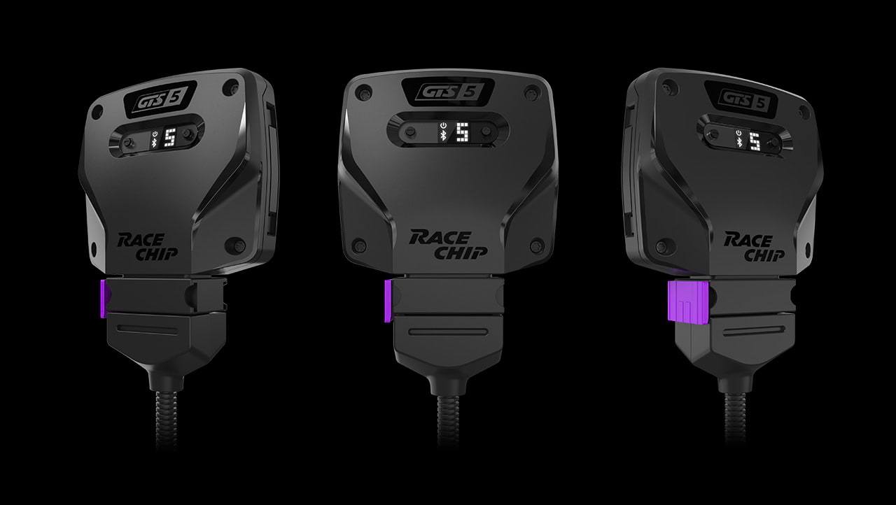 Three RaceChip GTS control units side by side, with LED display and violet safety lock.